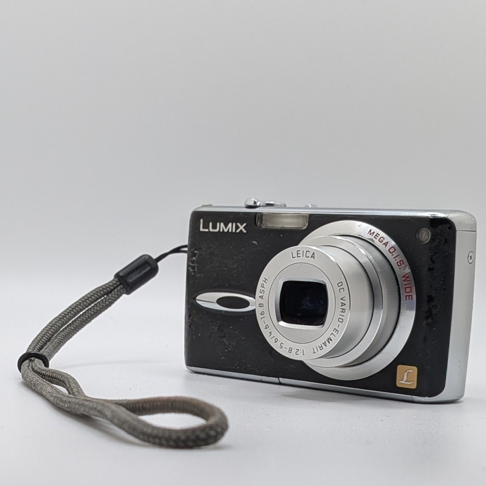 Panasonic Lumix Silver and Black Camera with 28mm Leica lens